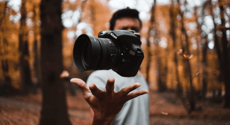 photographer with slr camera